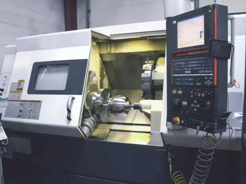CNC machining workshop cutting valve body flange faces