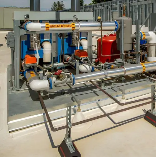 Biogas digester and gas treatment piping with industrial valves